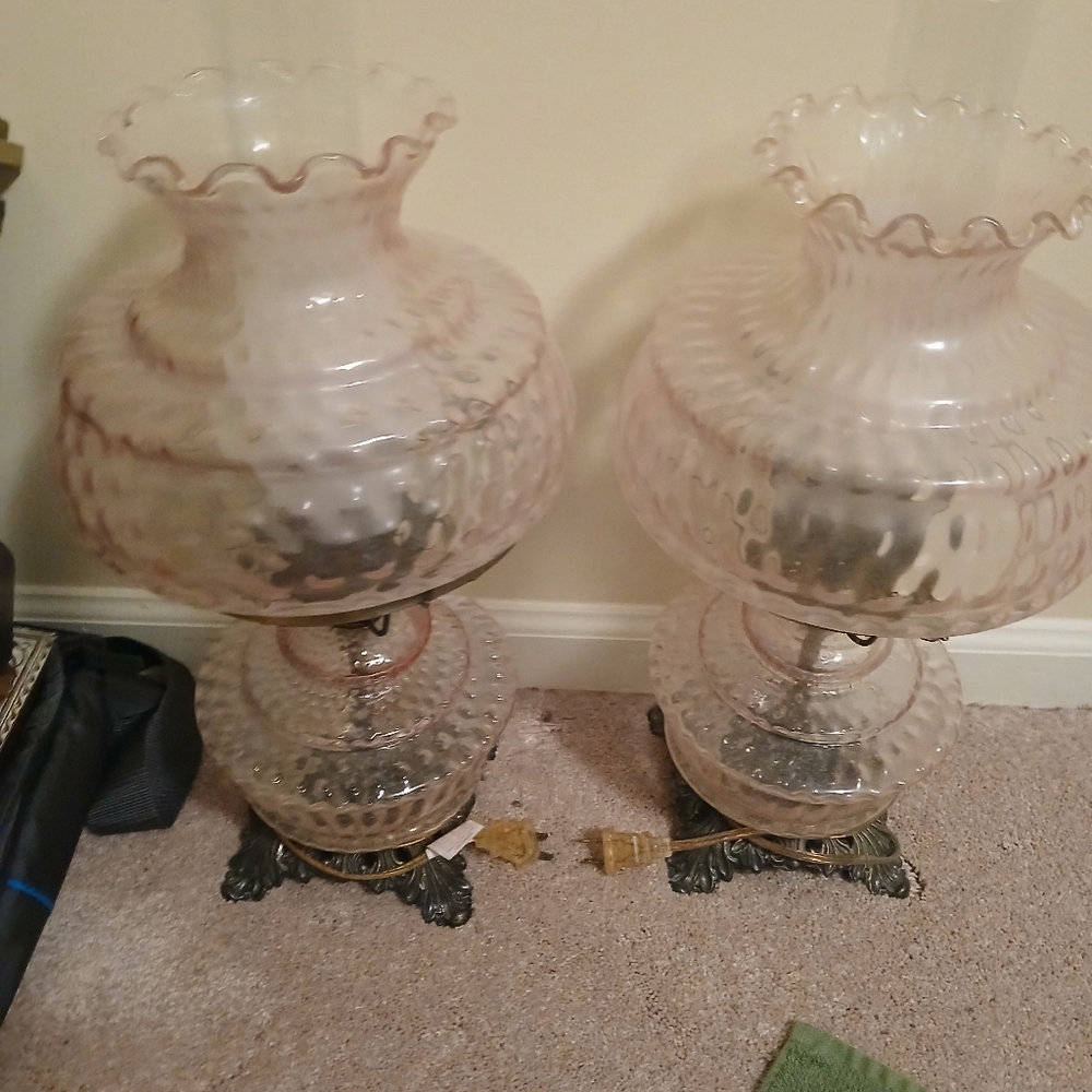 Two beautiful pink electric oil lamps